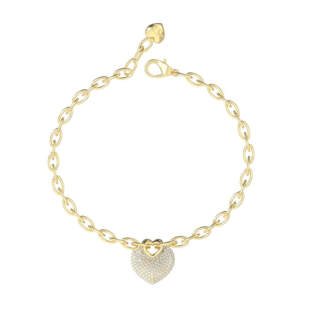Gold-tone chain bracelet with small heart-shaped charm and lobster clasp on neutral background.