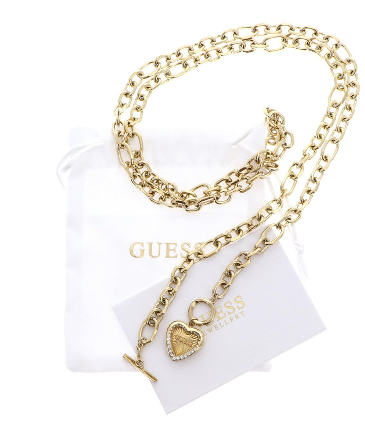 Gold chunky chain necklace with heart-shaped pendant and toggle clasp on neutral background