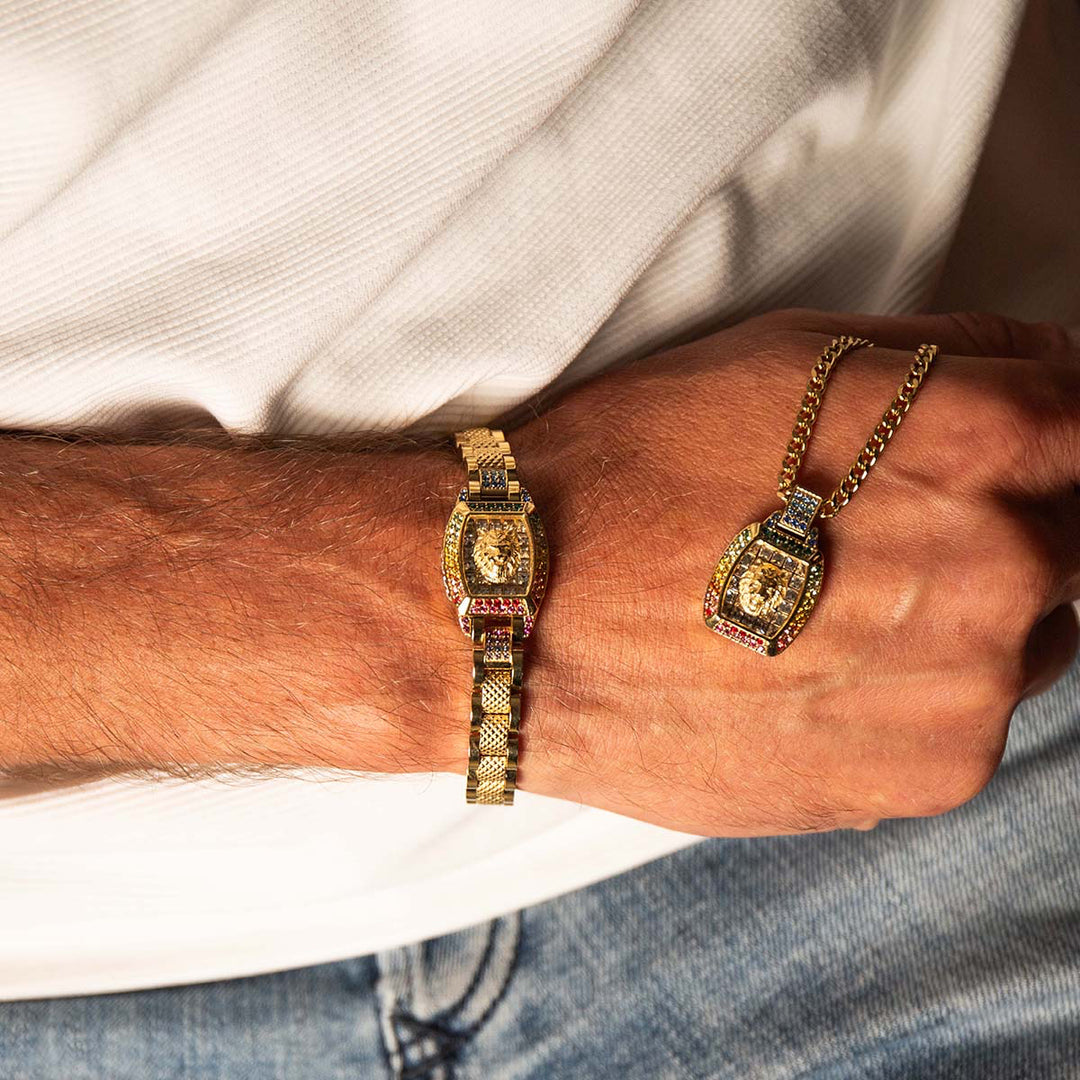 Gold link bracelet with lion head emblem and multicolor pavé stones on textured links for Man.