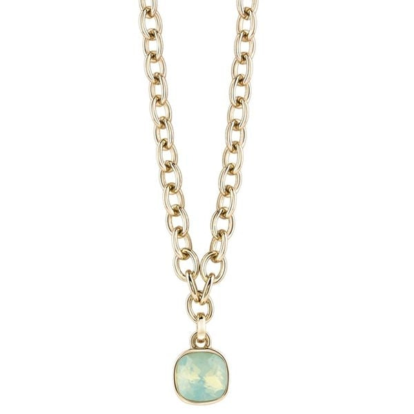 Gold chunky chain pendant necklace with square light-blue faceted stone on black background, packaged in box