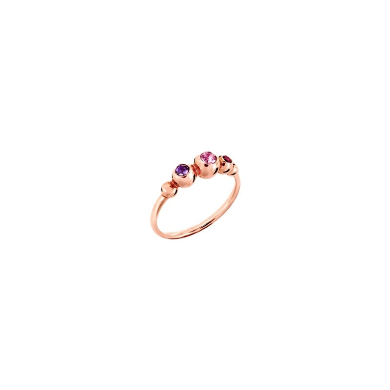 Rose gold delicate ring set with pink and purple gemstones on a soft neutral background for Women