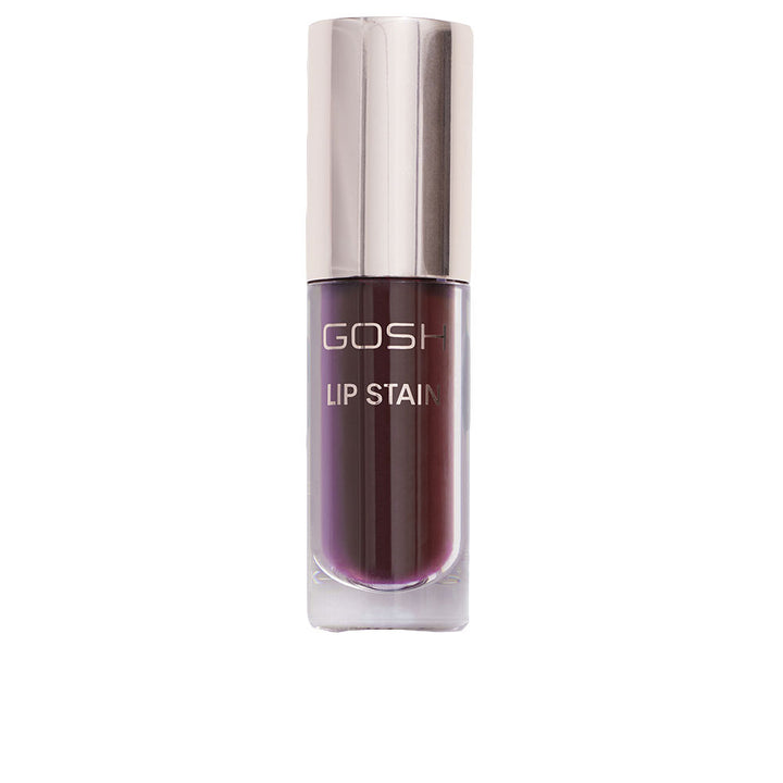Gosh longwear lip stain in dark purple, transparent cylindrical bottle with metallic cap and printed label